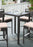 Armen Living Tropez Outdoor Patio Wicker Bar Table With Black Glass Top